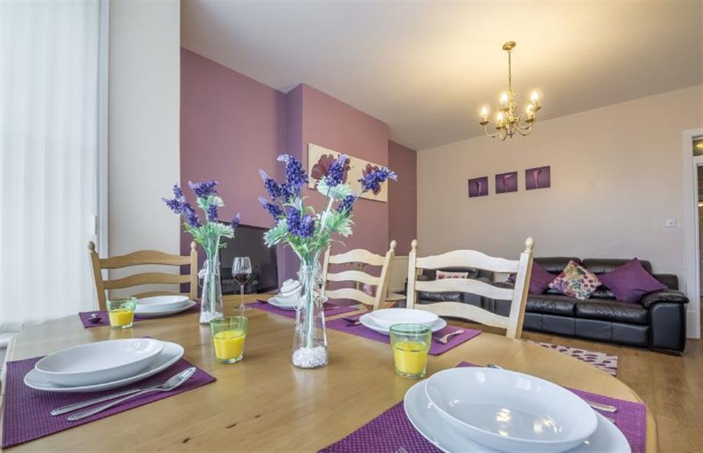 Ground floor: Dining area and Sitting room at Bay View Apartment, Hunstanton