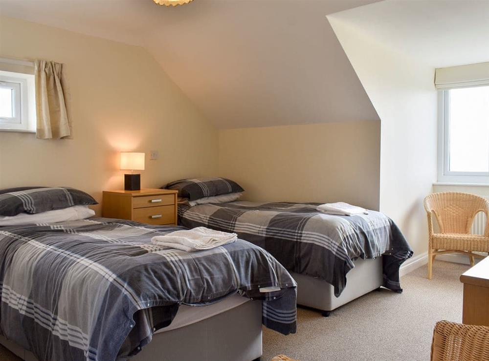 Comfortable twin bedroom with en-suite at Bay View in Carlyon Bay, near St Austell, Cornwall