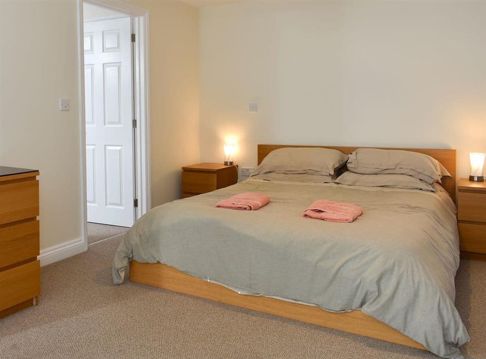 Spacious bedroom with en-suite and stunning sea views at Bay View in Carlyon Bay, near St Austell, Cornwall
