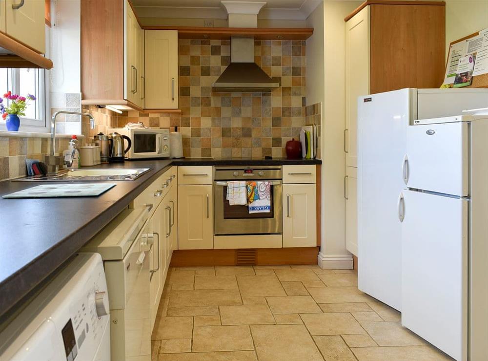 Well-equipped kitchen area at Bay View in Carlyon Bay, near St Austell, Cornwall