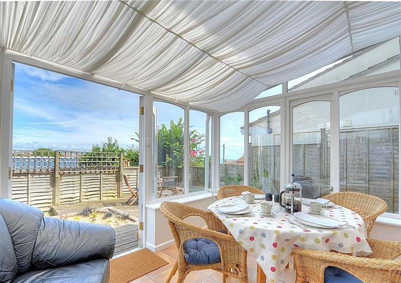 Relax in the living area (photo 2) at Bay View, Lyme Regis