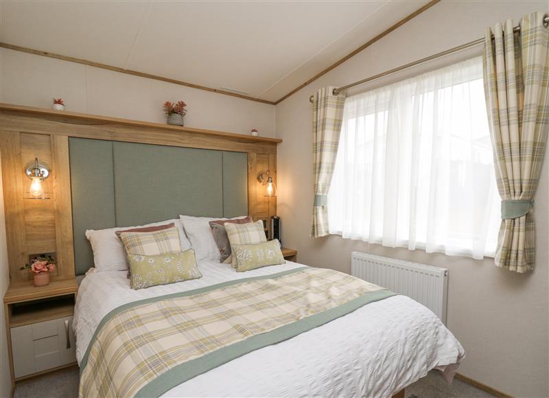A bedroom in Bay View at Bay View, Maen-y-Groes near Cross Inn