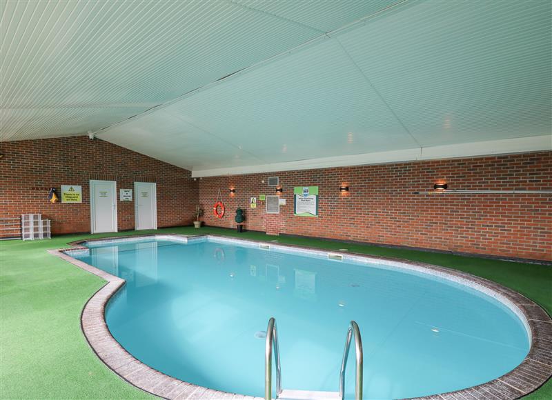 There is a swimming pool (photo 3) at Bay View, Maen-y-Groes near Cross Inn