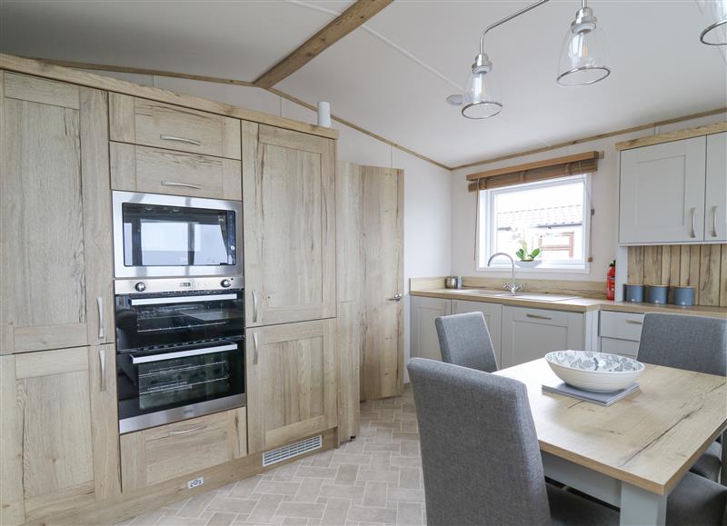 This is the kitchen (photo 2) at Bay View, Maen-y-Groes near Cross Inn