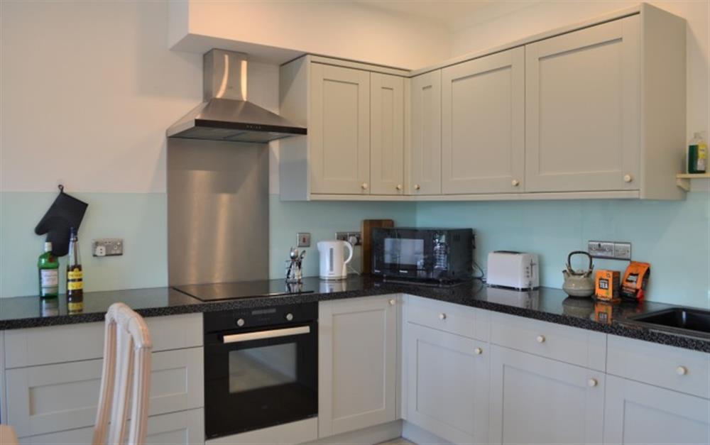 The beautifully renovated kitchen with all usual appliances. at Bay View in Maenporth