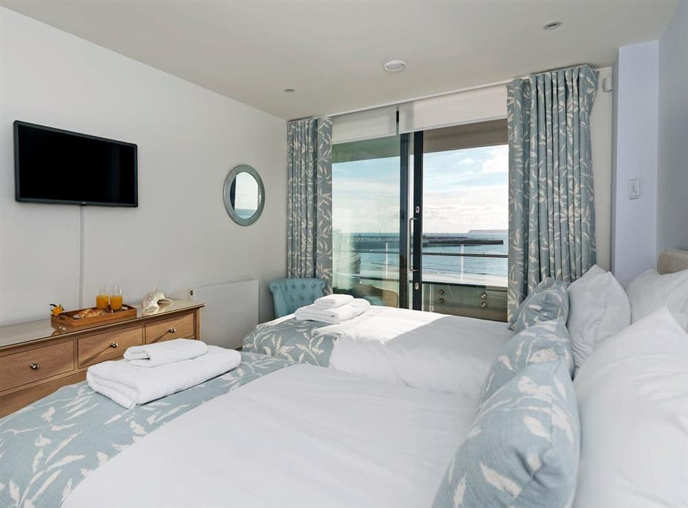 Charming twin bedroom with sea views (photo 2) at Bay View in Torquay, Devon