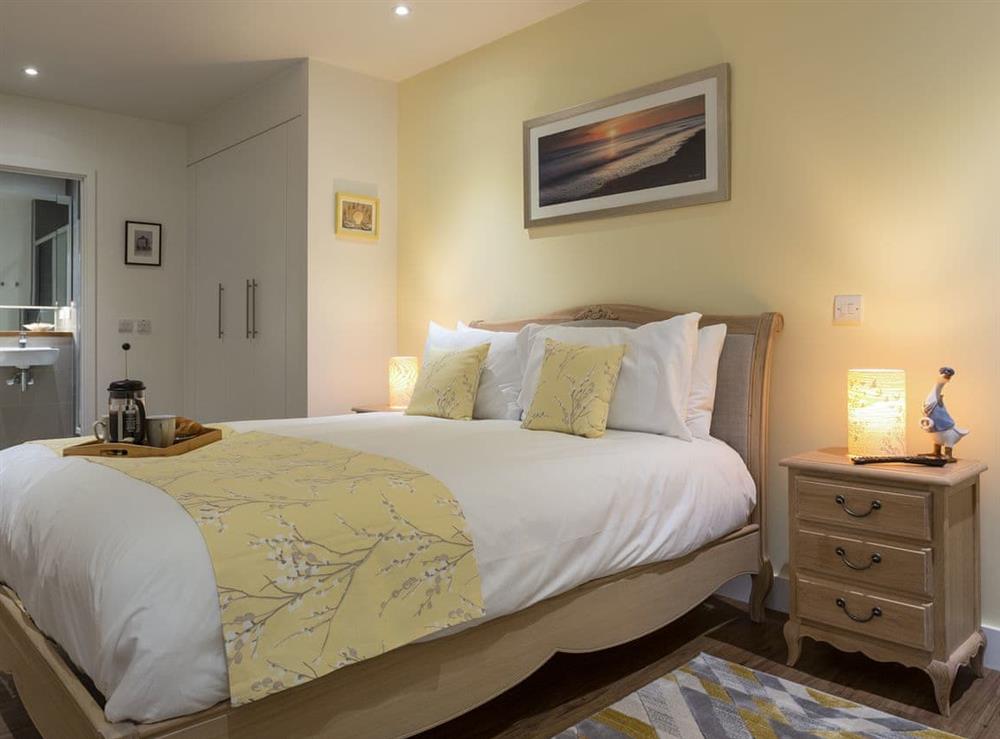Double bedroom with en-suite shower room at Bay View in Torquay, Devon