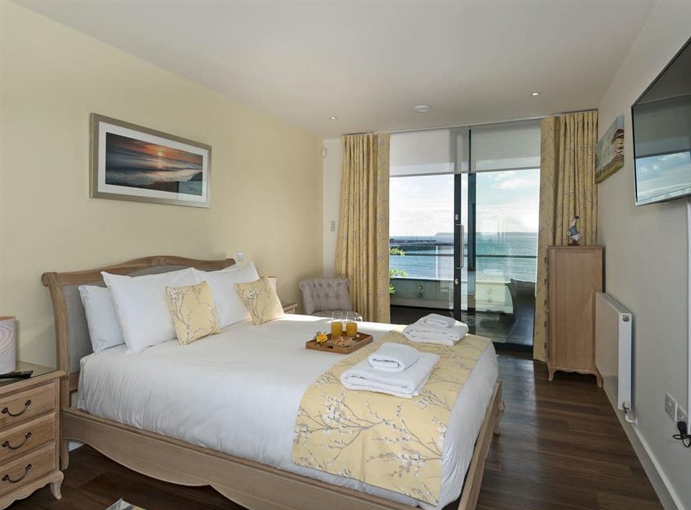 Sumptuous double bedroom with wonderful coastal views at Bay View in Torquay, Devon