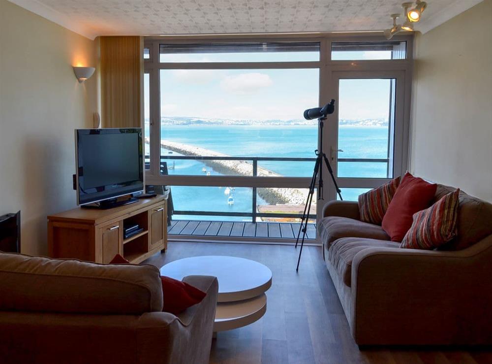 Comfortable living room with fantastic sea views at Bay Watch in Brixham, Devon