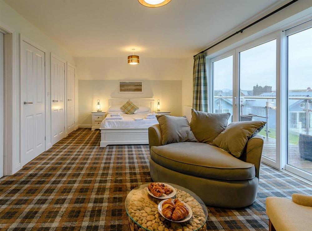 Double bedroom with seating area at Bayside in Filey, North Yorkshire