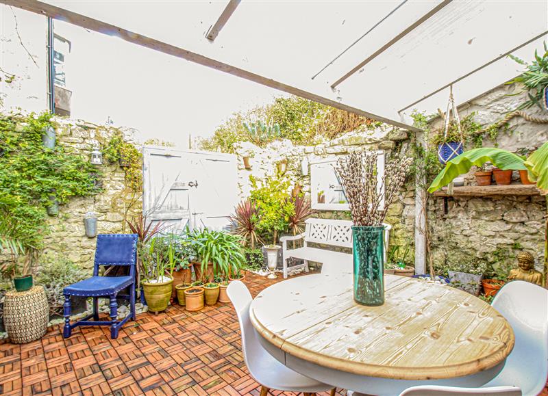 Enjoy a cup of tea on the patio at Bayview Villa, Fortuneswell