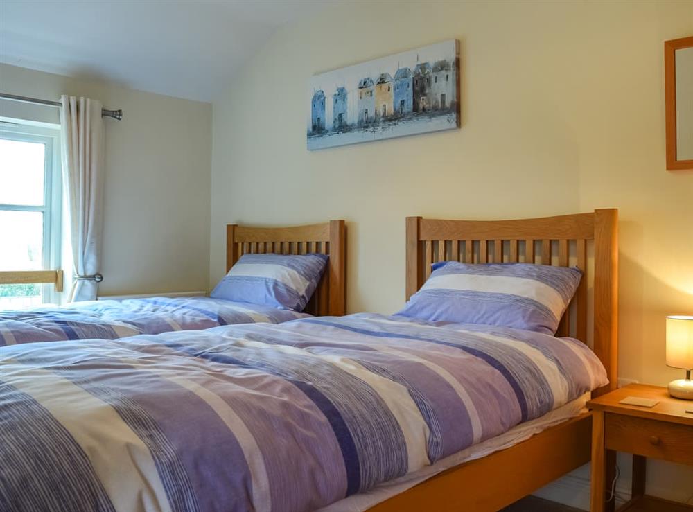 Twin bedroom at Bea Cottage in Bourton On The Water, Gloucestershire