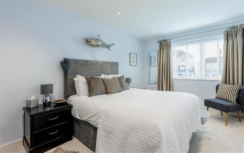 This is a bedroom at Beach Buoys in Sandbanks