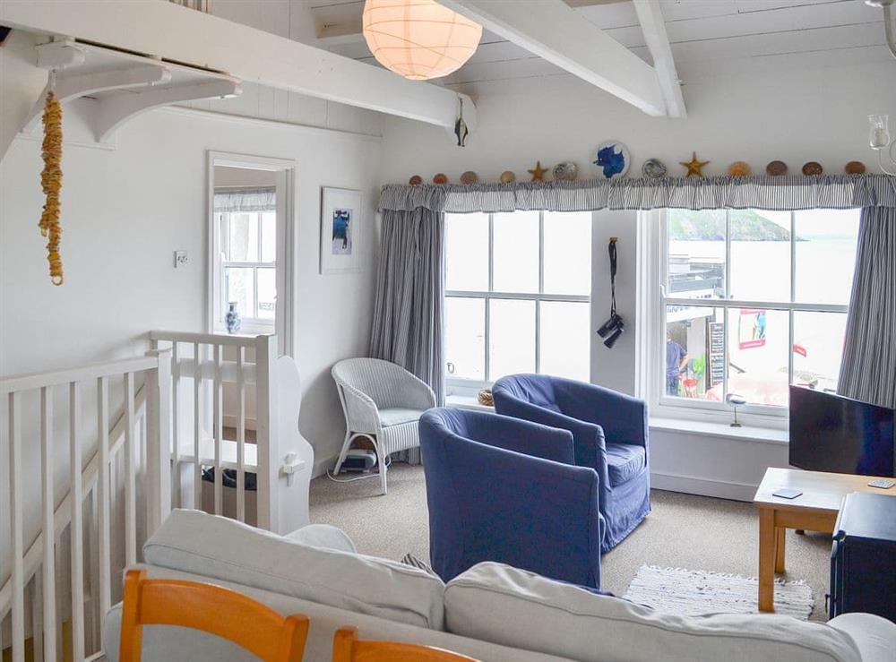 Beamed full height living space at Beach Corner Cottage in Gorran Haven, near St Austell, Cornwall