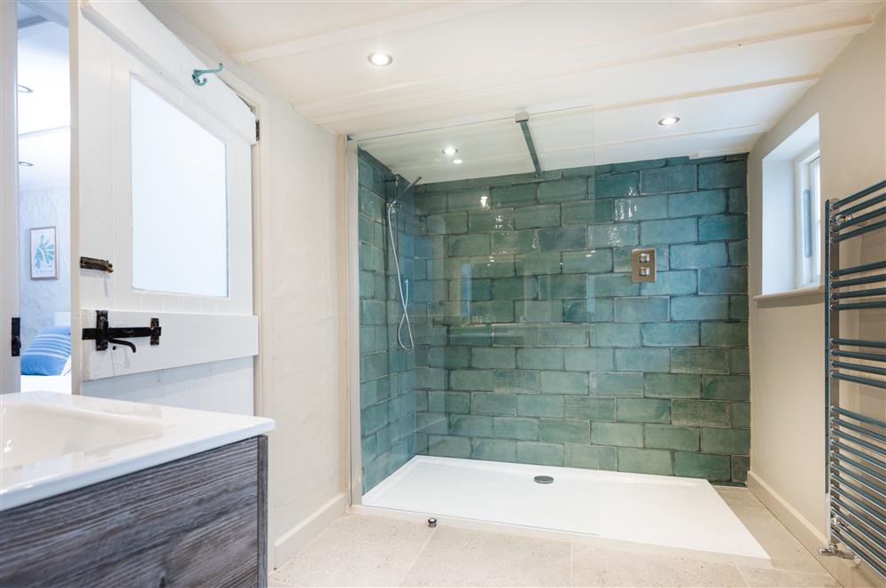 Beach Cottage:  En-suite shower room to the ground floor bedroom  at Beach Cottage and The Lobster Pot, St Agnes