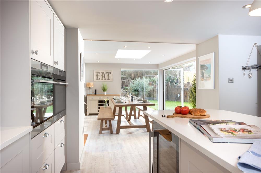 Beach Cottage:  Open-plan kitchen through to the dining area at Beach Cottage and The Lobster Pot, St Agnes