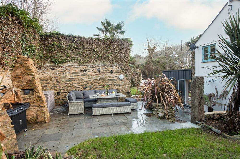 Beach Cottage: Terrace with garden furniture and barbecue at Beach Cottage and The Lobster Pot, St Agnes