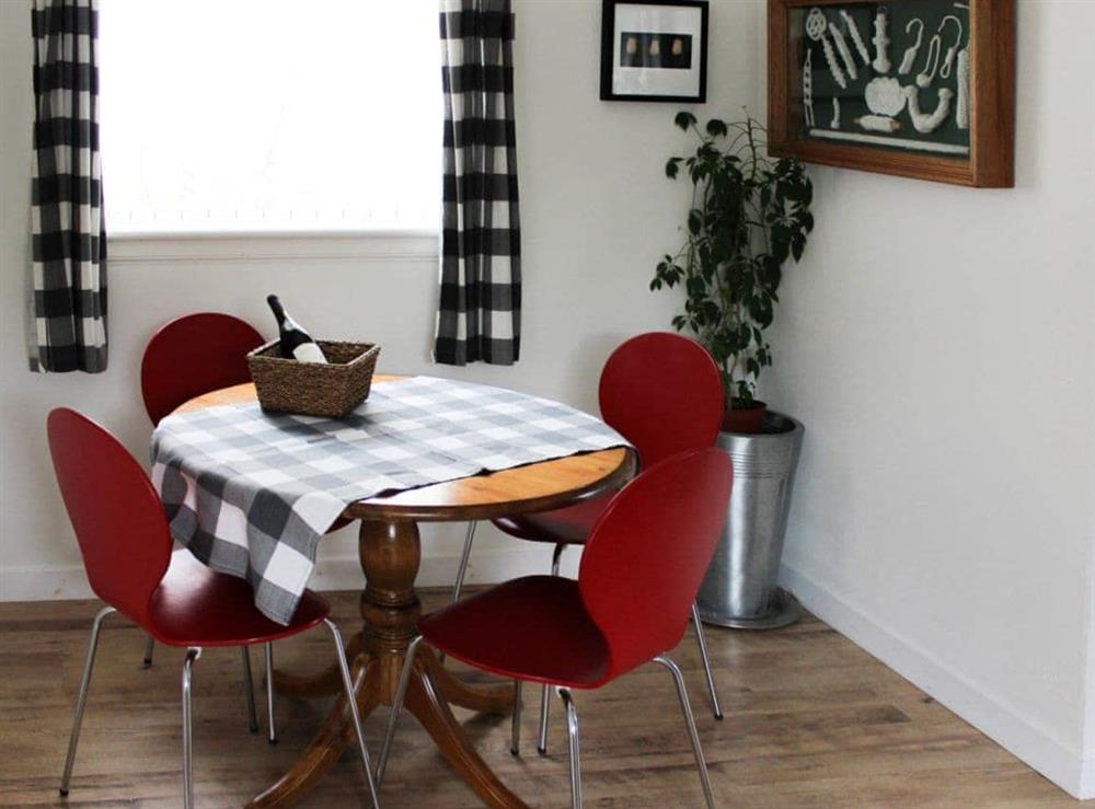 Compact and attractive dining area at Beach Cottage in Clachangarbh, Gairloch, Ross-Shire
