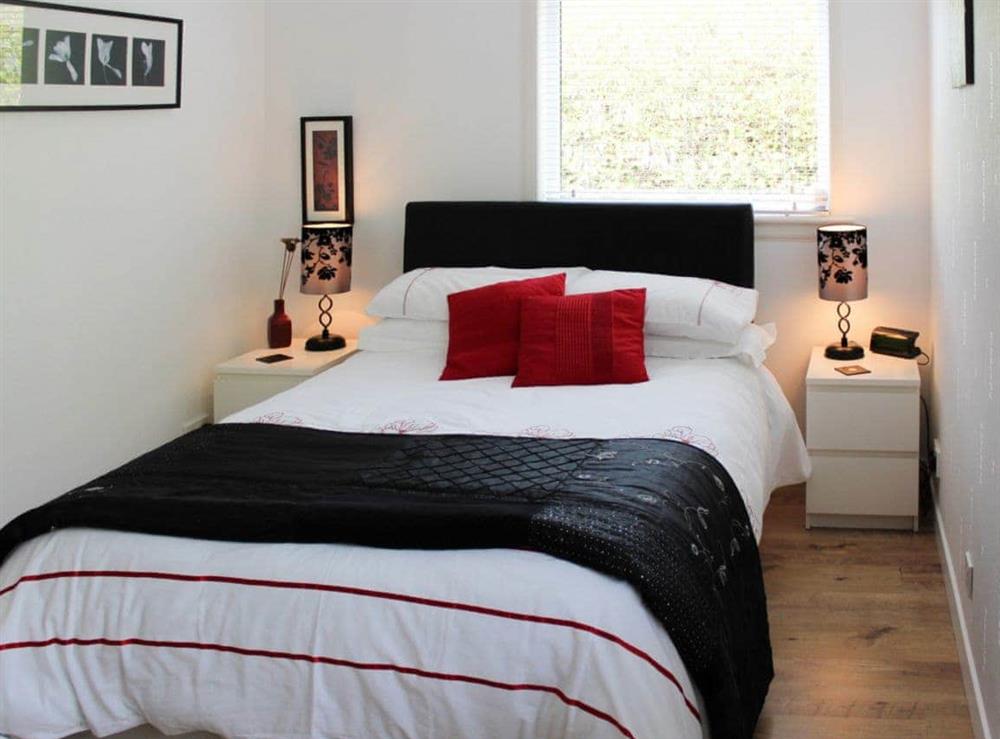 Welcoming and romantic double bedroom at Beach Cottage in Clachangarbh, Gairloch, Ross-Shire