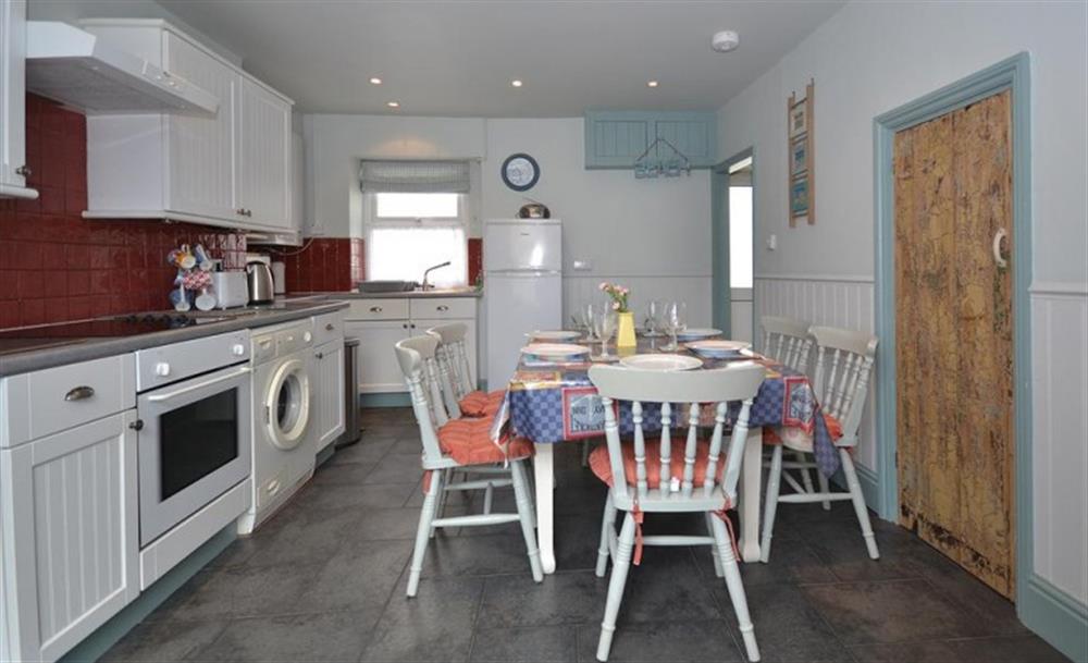 The kitchen and dining area at Beach Cottage in Looe