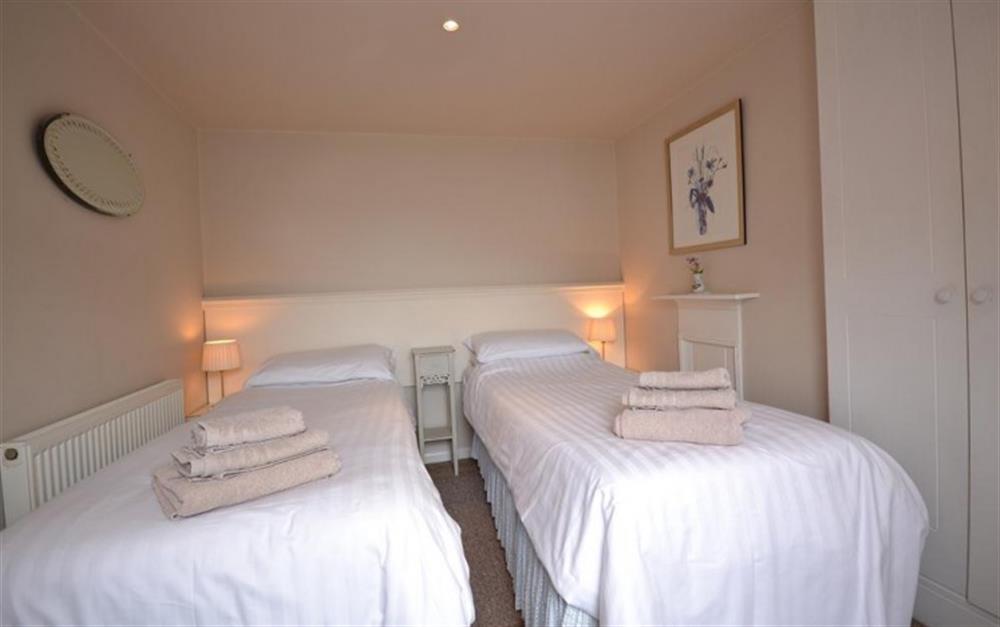 The twin bedroom at Beach Cottage in Looe