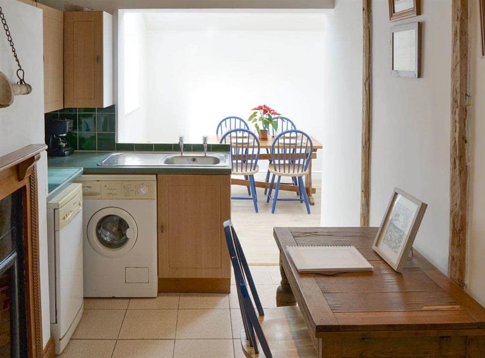Delightful kitchen with convenient dining area at Beach Cottage in Winterton-on-Sea, Norfolk