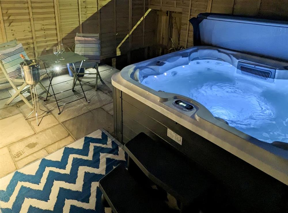 Enjoy our bubbling hot tub at Beach Escape in Scarborough, North Yorkshire