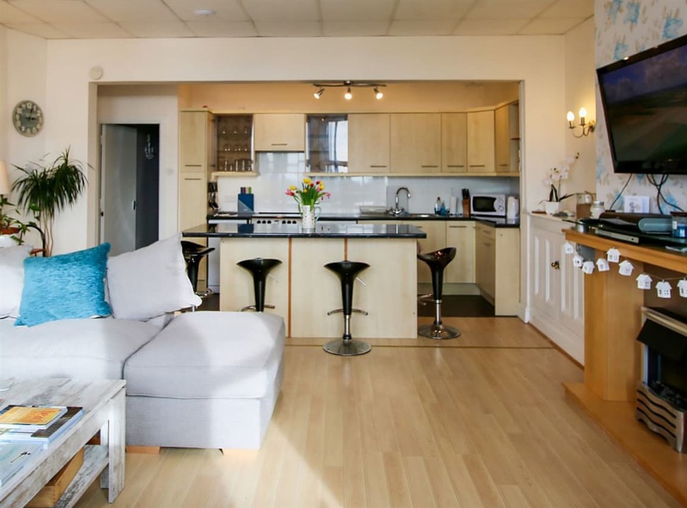 Open plan living space at Beach Front Apartment in Tywyn, Gwynedd