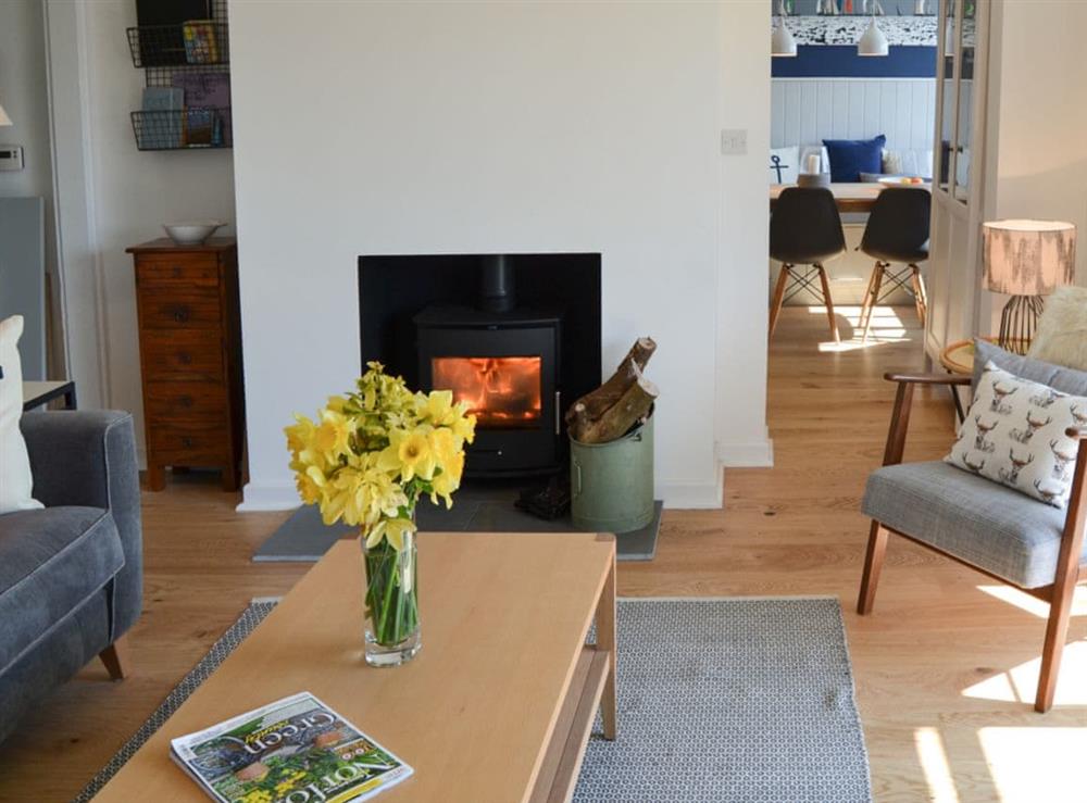Living room with wood burner (photo 2) at Beach Haven in Sheringham, Norfolk