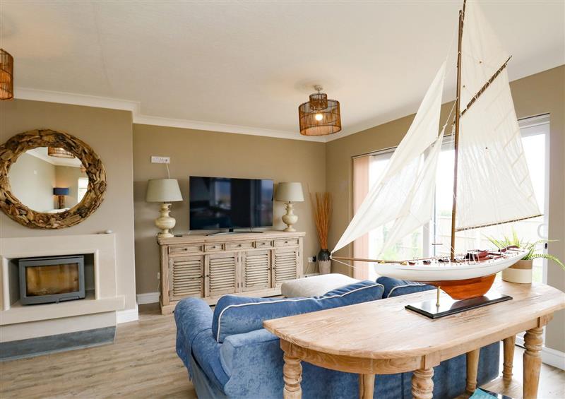 Relax in the living area at Beach Haven, West Bexington