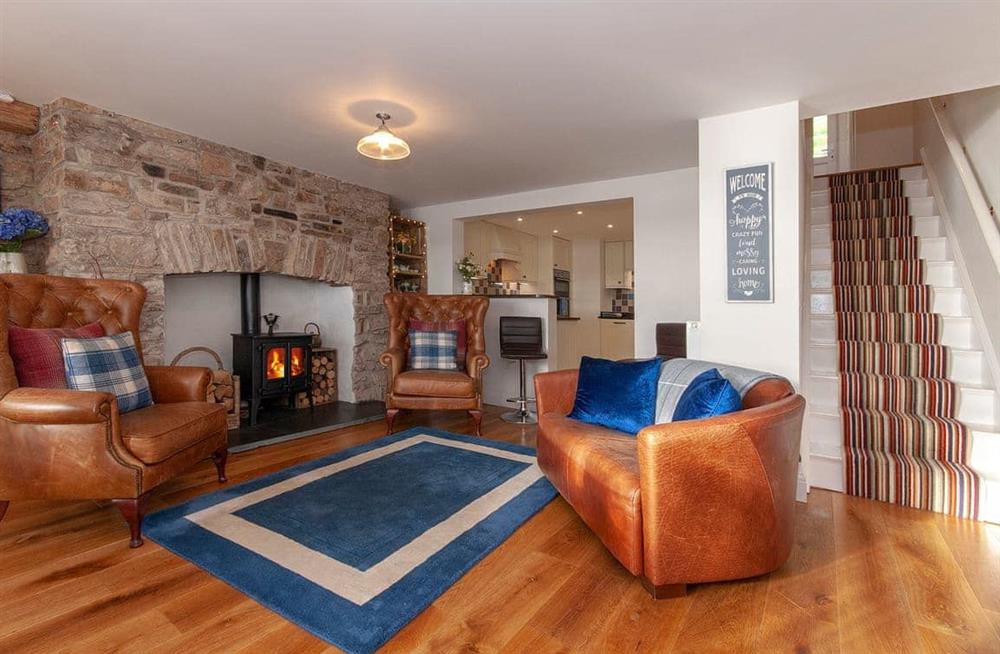 Relax in the living area (photo 2) at Beach House Cottage in Milford Haven, Pembrokeshire, Dyfed
