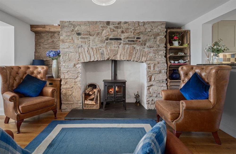 Relax in the living area at Beach House Cottage in Milford Haven, Pembrokeshire, Dyfed