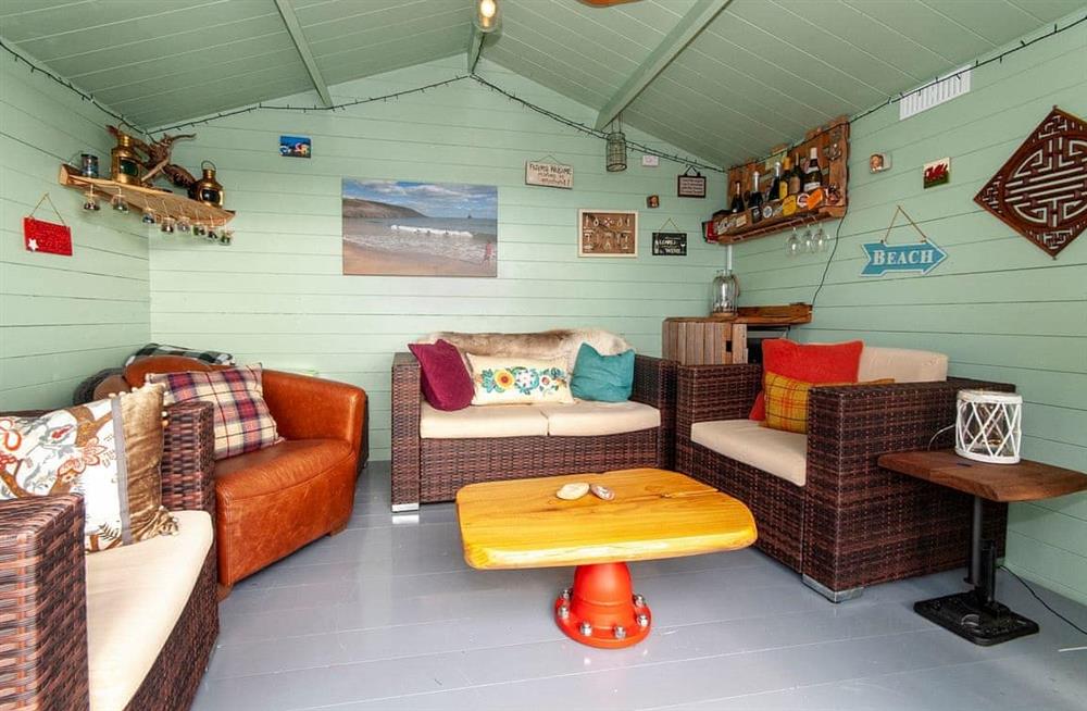 The living room at Beach House Cottage in Milford Haven, Pembrokeshire, Dyfed