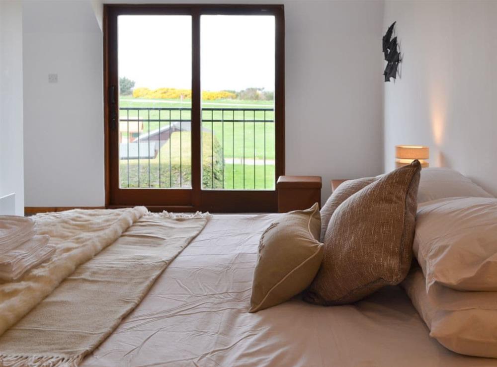Warm and inviting double bedroom with zip and link twin beds at Beach House in Nairn, Highlands, Morayshire