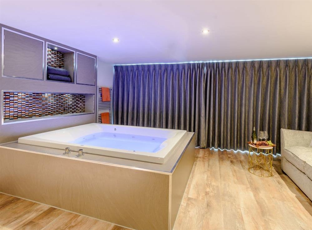 Spa area within the master bedroom (photo 3) at Beach House in Reighton Gap, near Filey, North Yorkshire