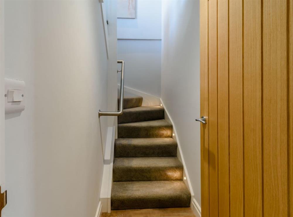 Stairs to first floor master bedroom suite at Beach House in Reighton Gap, near Filey, North Yorkshire