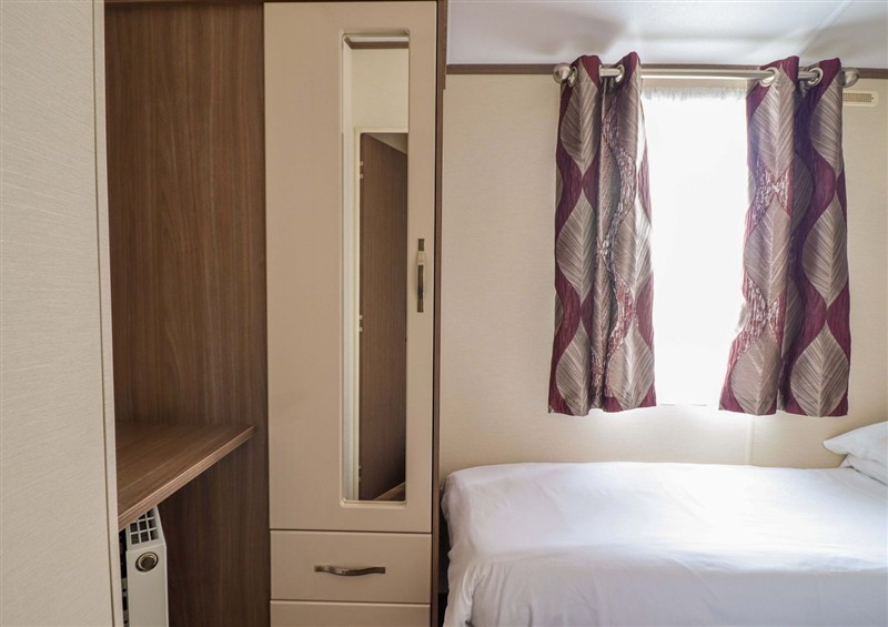 This is a bedroom at Beach Retreat E19 Dyffryn Seaside Estate, Dyffryn Ardudwy