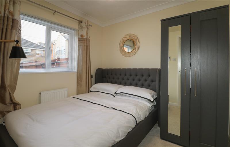 This is a bedroom at Beach Retreat, Seaford