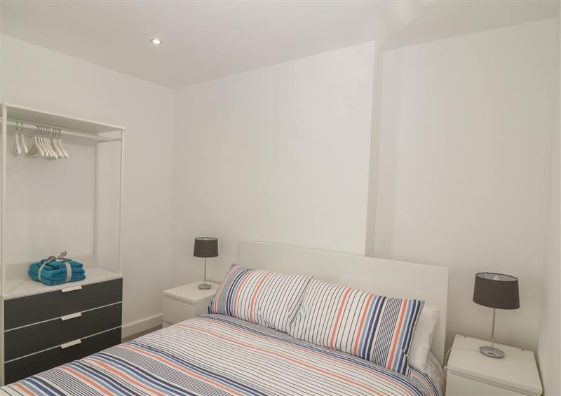 A bedroom in Beach Rose at Beach Rose, Teignmouth