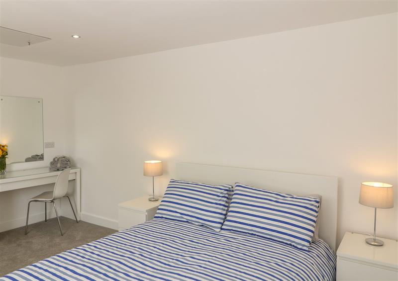 This is a bedroom at Beach Rose, Teignmouth