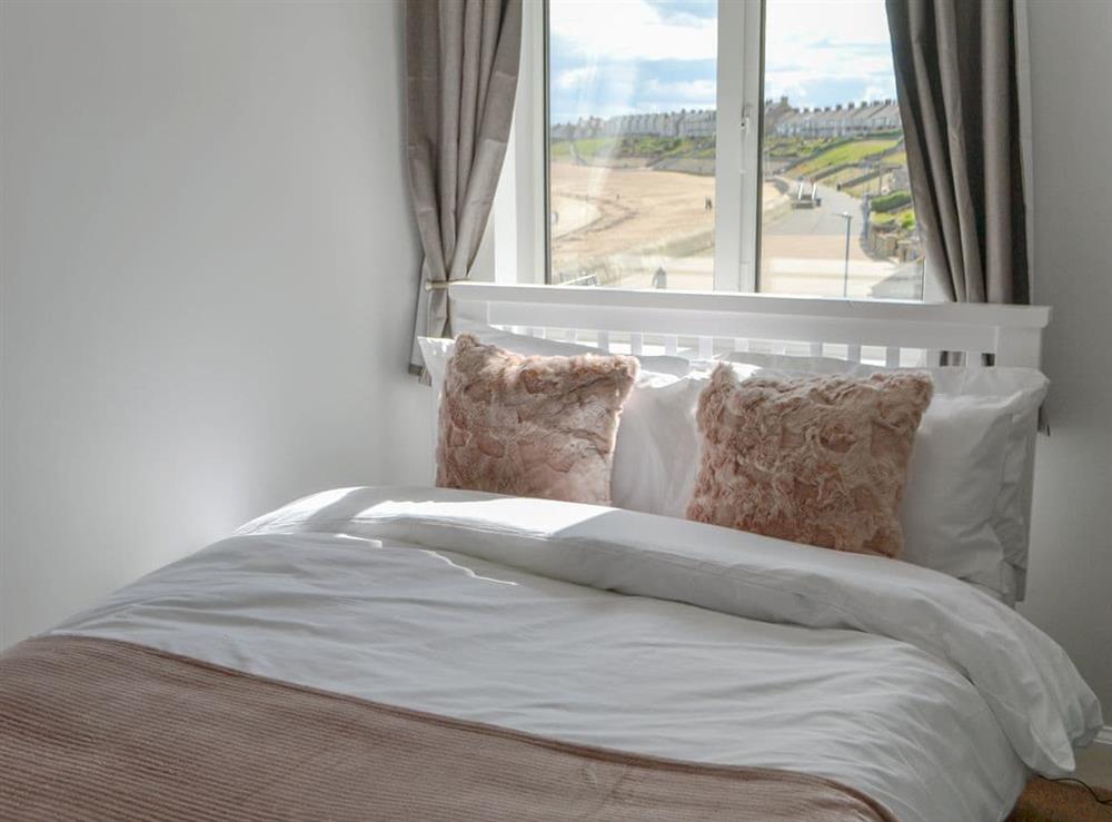 Comfortable double bedroom (photo 2) at Beach View Apartment in Newbiggin-by-the-Sea, Northumberland