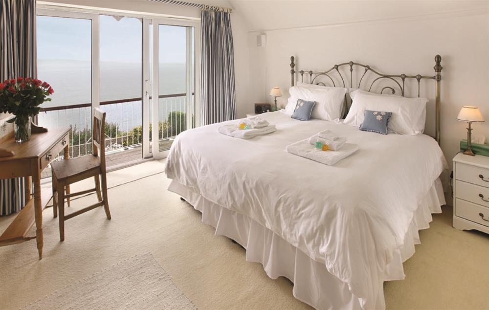Master bedroom with a 6’6 bed with magnificent views and en suite bathroom (photo 2) at Beach View, Southbourne