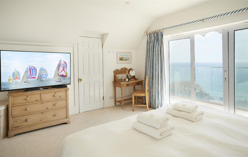 Master bedroom with a 6’6 bed with magnificent views and en suite bathroom (photo 3) at Beach View, Southbourne