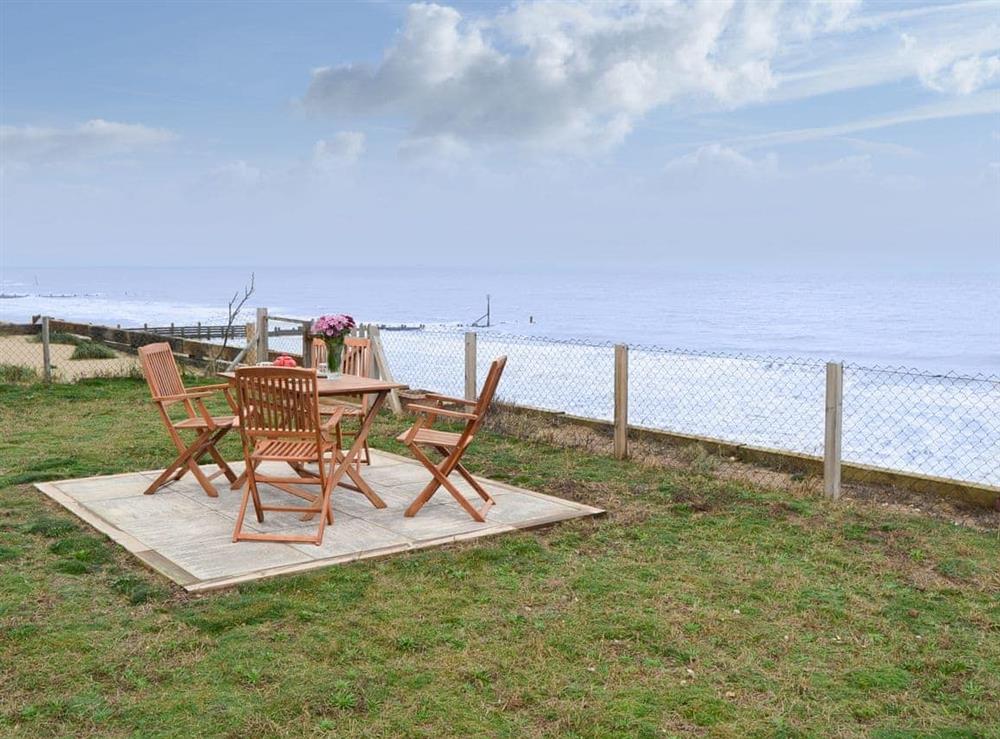 Small paved patio area overlooking the sea at Beach View in Walcott, near Happisburgh, Norfolk
