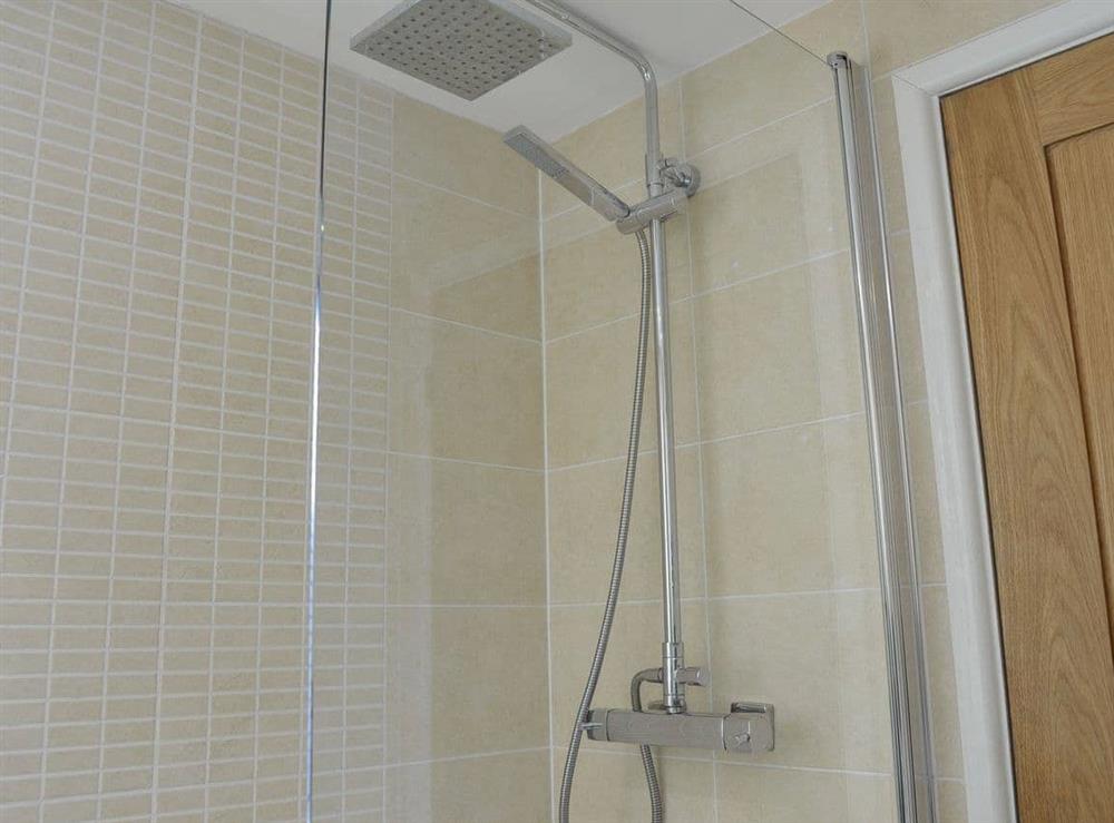 Bathroom with shower at Beachcomber Cottage in Marazion, Cornwall