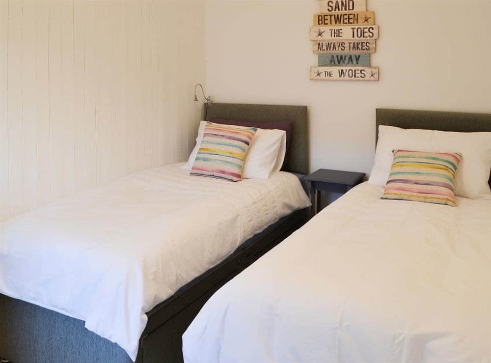 Cosy twin bedroom at Beachcomber Cottage in Newbiggin-by-the-Sea, near Ashington, Northumberland