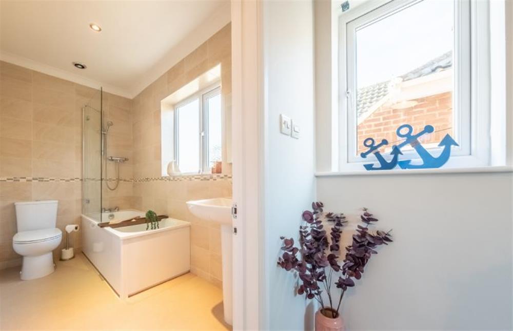 Family bathroom with bath and shower over at Beachcomber, Holme-next-the-Sea near Hunstanton