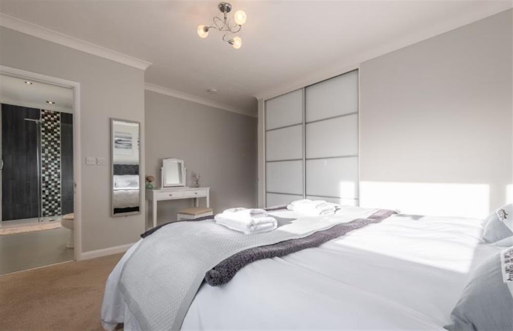 The master bedroom has an en-suite shower room at Beachcomber, Holme-next-the-Sea near Hunstanton