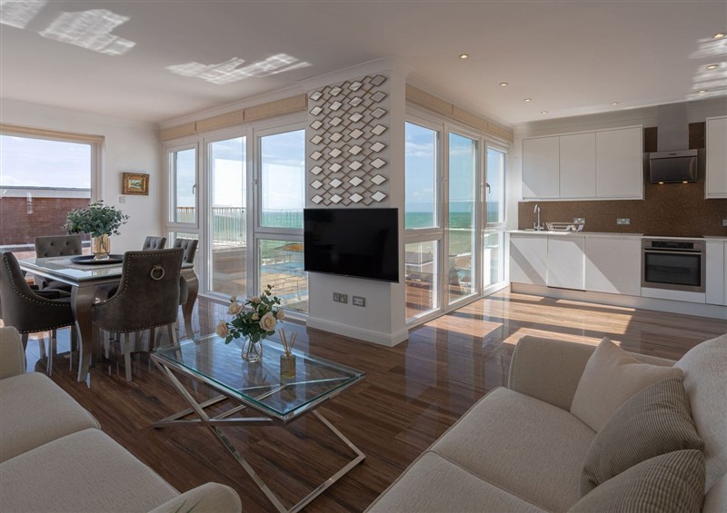 Relax in the living area at Beachfront Penthouse, Brighton