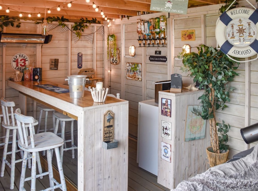 Sitting-out-area (photo 2) at Beachmans Cottage in Great Yarmouth, Norfolk
